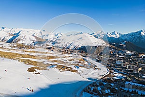 Panoramic drone view of landscape and ski resort in French Alps, Alpe D'Huez, France - Europe