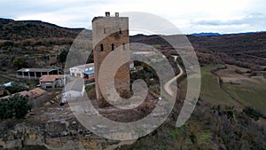 Panoramic drone view of old medieval 11th century defensive tower built at height of Reconquista and view of surrounding