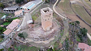 Panoramic drone view of old medieval 11th century defensive tower built at height of Reconquista and view of surrounding