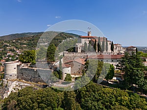 Panoramic drone view of the western part of the historic castle on a hill (colle Cidneo) in the city of Brescia photo