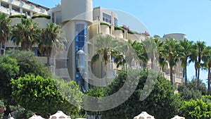 Panoramic elevator in five star hotel overlooking seaside, luxury vacation