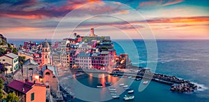 Panoramic evening cityscape of Vernazza port, Cinque Terre region. Unbelievable summer sunset on Liguria, Italy, Europe. Superb se