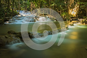 Panoramic exotic  beautiful tropical deep rainforest waterfa photo