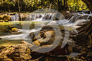 Panoramic exotic  beautiful tropical deep rainforest waterfall  and lake panorama landscape of Huay Mae Khamin waterfall in the