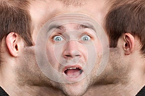Panoramic face of frightened man
