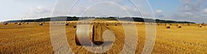 Panoramic field and hay bales