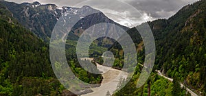 Panoramic format photo of the fresh spring green foliage in the Lillooet-Fraser Canyon, British Columbia, Canada