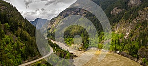 Panoramic format photo of the fresh spring green foliage in the Lillooet-Fraser Canyon, British Columbia, Canada