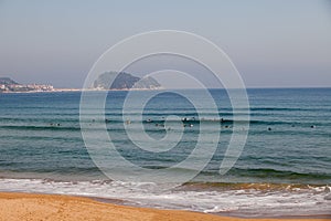 Panoramic of Getaria and surfers in Zarauz photo