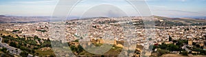 Panoramic high angle view of the old Fez city in Morocco under the cloudy sky