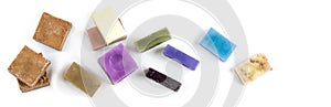 panoramic Homemade soaps. Variety of colorful handmade soap bars on wooden background