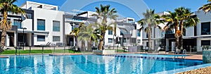 Panoramic image beautiful town houses with swimming pool, Torrevieja, Spain photo
