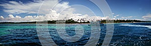 Panoramic image of boats and liners in the sea.