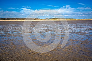 Panoramic image of Pembrey beach at low tide, southern Wales