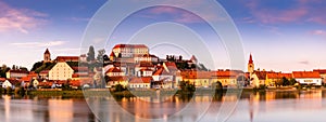 Panoramic Image of Ptuj Cityscape in Slovenia. Townscape Reflection in River at Sunset