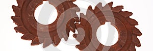Panoramic image. Two incredible rusty chocolate gears