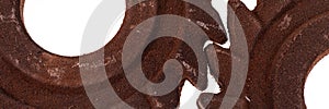 Panoramic image. Two incredible rusty chocolate gears