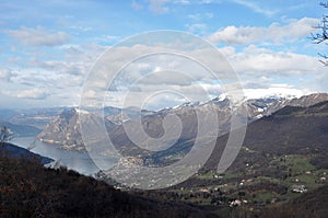 Panoramic image of Valcamonica with Lake Iseo and in the background the snow-capped mountains - Brescia - Italy 08