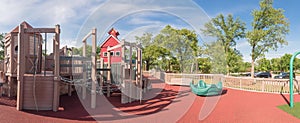 Panoramic kid wooden playground recreation area at American public park