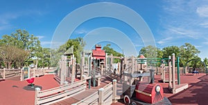 Panoramic kid wooden playground recreation area at American public park