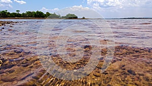 PANORAMIC LAKE IN SUMMER WITH SUN photo