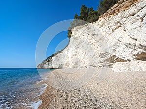 Panoramic landscape of the beach and the white cliffs of Gargano peninsula.   Apulia, Italy.
