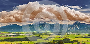 Panoramic landscape with dramatic clouds on sky