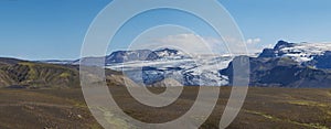 Panoramic landscape with eyjafjallajokull glacier tongue, Markarfljot river and green hills. Fjallabak Nature Reserve