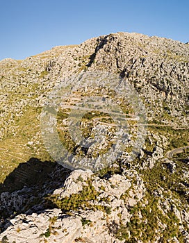 Panoramic landscape. Hairpin turn road between rocky mountains. Way to Sa Calobra beach, Mallorca, Balearic Islands