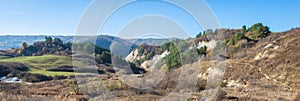 Panoramic landscape image of Salt Mountains near Praid, Romania