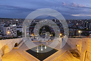 Panoramic landscape night scene of Yerevan capital of Armenia city with lights and mount Ararat