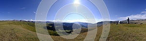 Panoramic landscape of observatory telescope on green valley among mountains mountains in day, great design for any purposes.