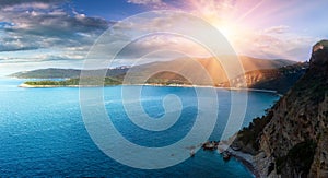 Panoramic landscape of the rocky coastline sea and Jaz Beach at sunshine. Budva, Montenegro.