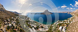 Panoramic landscape of Telendos island in distance and part of Kalymnos island