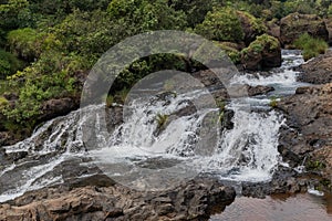 Panoramic landscape view of beautiful stream of water flowing through nature in Thoseghar village, Satara, Maharashtra, India