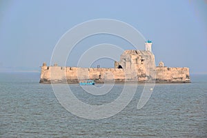 Panoramic landscape view of Fortim-do-Mar also known as Panikota Fort or Pani Kotha or Diu Jail located in Arabian Sea opposite