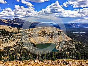 Panoramic Landscape View of Uinta Mountains, clouds, lakes and forest, Utah, USA, America West