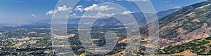 Panoramic Landscape view of Wasatch Front Rocky and Oquirrh Mountains, Rio Tinto Bingham Copper Mine, Great Salt Lake Valley in su photo