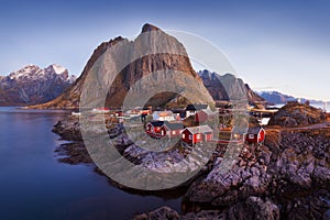 Panoramic landscape, winter mountains and fjord reflection in water. Norway, the Lofoten Islands. photo