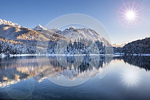 Panoramic landscape in winter wirh mountain range photo