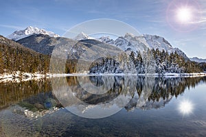 Panoramic landscape in winter wirh mountain range photo