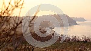 Panoramic lanscape of sea bay in summer sunset. Fabulous sunset in the rocks, amazing nature