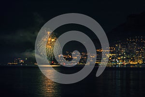 Panoramic lovely view of fireworks on the Principality of Monaco shortly after sunset