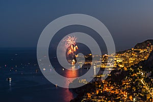 Panoramic lovely view of fireworks on the Principality of Monaco shortly after sunset