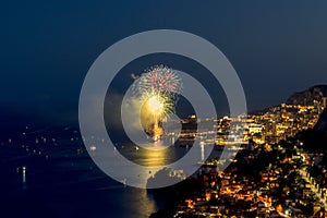 Panoramic lovely view of fireworks on the Principality of Monaco shortly after sunset