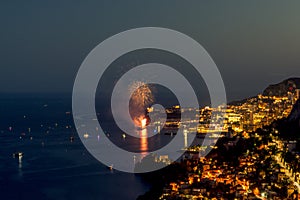 Panoramic lovely view of fireworks on the Principality of Monaco shortly after sunset