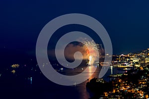 Panoramic lovely view of fireworks on the Principality of Monaco shortly after sunset