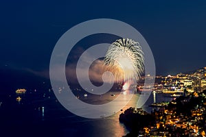 Panoramic lovely view of fireworks on the Principality of Monaco shortly after sunset