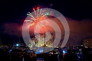 Panoramic lovely view of fireworks on Principality of Monaco on a stormy day