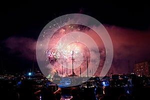 Panoramic lovely view of fireworks on  Principality of Monaco on a stormy day